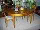 Tisch with 3 extension plates,8 chairs and 2 sideboards all in birch