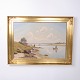 Painting on canvas depicting a coastal scene with fishermen in a gilt frame