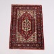 Oriental Rug with Medallion and Floral Pattern in Red Tones 130 x 91 cm